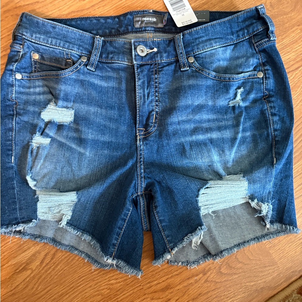 Torrid distressed cutoff Jean shorts size 12